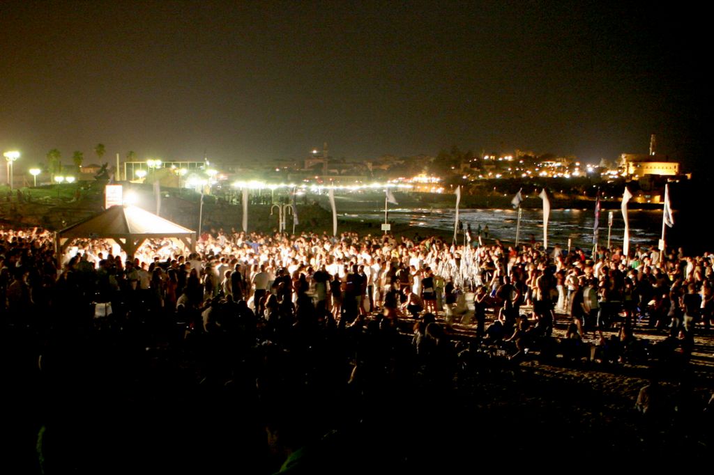 Partying on the beach on a past White Night (photo credit: Lior Almog/Flash 90) Partying on the beach on a past White Night (photo credit: Lior Almog/Flash 90)