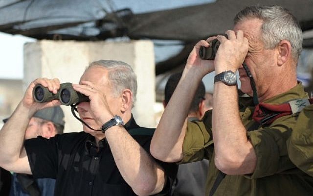 Prime Minister Benjamin Netanyahu, left, and then-IDF chief of staff Lt. Gen. Benny Gantz watch a military exercise of the army's Golani Brigade on the Golan Heights, September 11, 2012. (Avi Ohayon/GPO/Flash90) Prime Minister Benjamin Netanyahu, left, and then-IDF chief of staff Lt. Gen. Benny Gantz watch a military exercise of the army's Golani Brigade on the Golan Heights, September 11, 2012. (Avi Ohayon/GPO/Flash90)