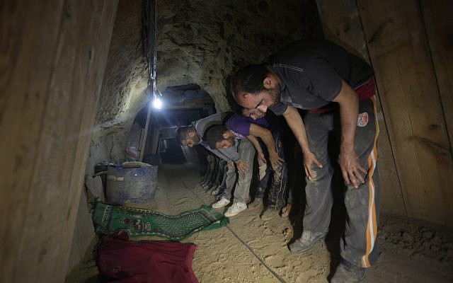 Tunnel workers taking time off to pray on the Gaza side of Rafah. (Wissam Nassar/Flash90) Tunnel workers taking time off to pray on the Gaza side of Rafah. (Wissam Nassar/Flash90)