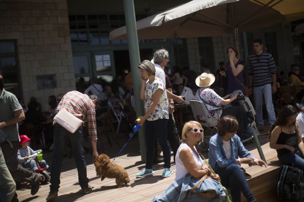 Jerusalemites basking in the newfound fun at The First Station, which mixes kosher and non-kosher, Shabbat and non-Shabbat activities (photo credit: Yonatan Sindel/Flash 90) Jerusalemites basking in the newfound fun at The First Station, which mixes kosher and non-kosher, Shabbat and non-Shabbat activities (photo credit: Yonatan Sindel/Flash 90)