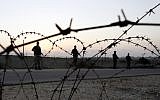 Hamas forces on the Gaza-Egypt border (photo credit: Abed Rahim Khatab/Flash 90)