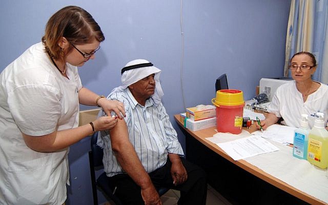 A resident of the southern Bedouin village of Rahat receives a polio immunization on June 4, 2013. (photo credit: Flash90) A resident of the southern Bedouin village of Rahat receives a polio immunization on June 4, 2013. (photo credit: Flash90)