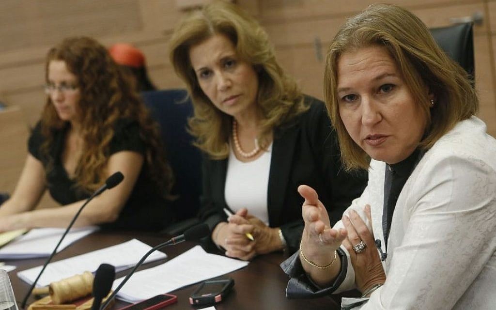 MK Aliza Lavie of Yesh Atid (center) with Minister of Justice Tzipi Livni (right) at a Committee for the Status of Women meeting in the Knesset, June 10, 2013. (photo credit: Miriam Alster/Flash90) MK Aliza Lavie of Yesh Atid (center) with Minister of Justice Tzipi Livni (right) at a Committee for the Status of Women meeting in the Knesset, June 10, 2013. (photo credit: Miriam Alster/Flash90)