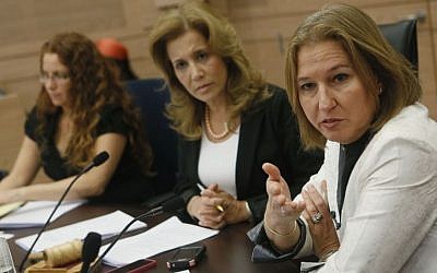 MK Aliza Lavie of Yesh Atid (center) with Minister of Justice Tzipi Livni (right) at a Committee for the Status of Women meeting in the Knesset, June 10, 2013. (photo credit: Miriam Alster/Flash90)