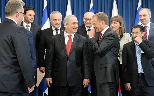 Prime Minister Bnejamin Netanyahu meets with Poland's PM Donald Tusk and poses for a group photo with their government ministers, in Warsaw, Poland on June 12, 2013. (photo credit: Kobi Gideon/GPO/Flash90) Prime Minister Bnejamin Netanyahu meets with Poland's PM Donald Tusk and poses for a group photo with their government ministers, in Warsaw, Poland on June 12, 2013. (photo credit: Kobi Gideon/GPO/Flash90)