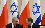 Israeli Prime Minister Benjamin Netanyahu speaks with Polish Prime Minister Donald Tusk in Warsaw on Wednesday (photo credit: Kobi Gideon / GPO/FLASH90)