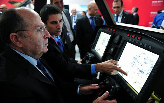 Defense Minister Moshe Ya'alon at the inauguration ceremony of the Israeli pavilion at a previous annual air show in Paris, France. (Ariel Hermoni/DefenseMinistry/Flash90) Defense Minister Moshe Ya'alon at the inauguration ceremony of the Israeli pavilion at a previous annual air show in Paris, France. (Ariel Hermoni/DefenseMinistry/Flash90)