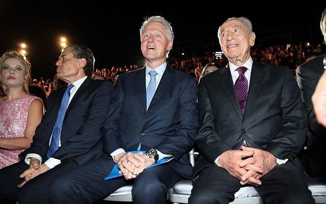 Former US president Bill Clinton with Shimon Peres at the Peres Academic Center in Rehovot on June 17, 2013 (Photo credit: Flash90) Former US president Bill Clinton with Shimon Peres at the Peres Academic Center in Rehovot on June 17, 2013 (Photo credit: Flash90)