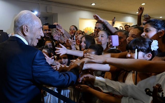 Israelis greet President Shimon Peres a at a celebration event in honor of his 90th birthday, in Jerusalem on Tuesday, June 18 (photo credit: Kobi Gideon/Flash90) Israelis greet President Shimon Peres a at a celebration event in honor of his 90th birthday, in Jerusalem on Tuesday, June 18 (photo credit: Kobi Gideon/Flash90)