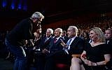 Illustrative: Israeli singer Shlomo Artzi sings in front of President Shimon Peres (C) Prime Minister Benjamin Netanyahu and former US President Bill Clinton (L) at a celebration in honor of Peres's 90th birthday, in Jerusalem, June 18, 2013. (Kobi Gideon/GPO/Flash90)