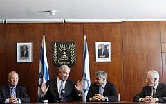 (From left) Jacob Frenkel, Prime Minister Benjamin Netanyahu, Finance Minister Yair Lapid and outgoing Bank of Israel Governor Stanley Fischer at a press conference in the Knesset in Jerusalem, on June 24, 2013. (photo credit: Miriam Alster/Flash90)