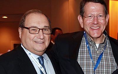 Abraham Foxman, left, and Christopher Wolf, co-authors of 'Viral Hate,' at the ADL Centennial Summit in Washington, April 29, 2013. (photo credit: David Karp/via JTA)