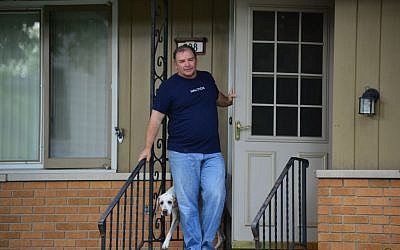 A man who owns the house where Michael Karkoc lived in Minneapolis said that he wasn't home on Friday, June 14. (photo credit: AP/The Star Tribune, Richard Sennott)