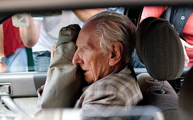 Alleged Hungarian war criminal Laszlo Csatary sits in a car as he leaves the Budapest Prosecutor's Office after he was questioned by detectives on charges of war crimes during WWII, on July 18, 2012. (photo credit: AP Photo/MTI, Bea Kallos) Alleged Hungarian war criminal Laszlo Csatary sits in a car as he leaves the Budapest Prosecutor's Office after he was questioned by detectives on charges of war crimes during WWII, on July 18, 2012. (photo credit: AP Photo/MTI, Bea Kallos)