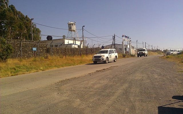 UNDOF trucks leaving Camp Ziouani, a few hundred meters from the Quneitra border crossing. (photo credit: Ilan Ben Zion/Times of Israel staff)