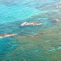 Dancing blue and green water surrounding Herod's palace on the sea (photo: Qanta Ahmed)
