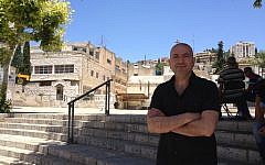 Looking over Hany Abu-Assad's shoulder at a view of Nazareth (photo credit: Jessica Steinberg/Times of Israel)