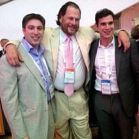 Men in suits, particularly the cream poplin with pink tie (Photo credit: Sarah Tuttle-Singer/Times of Israel)