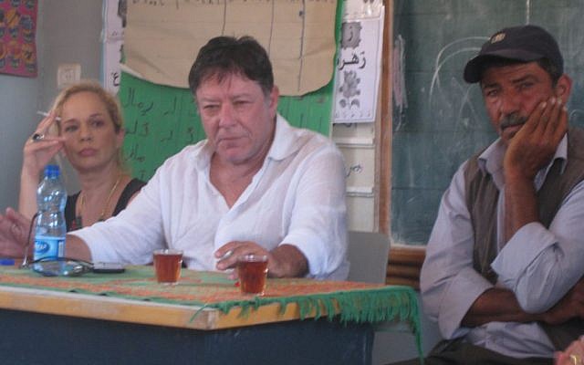 Attorney Shlomo Lecker, center, legal counsel for villagers in Firing Zone 918, flanked by village leader Othman Jibril (left) and writer Alona Kimchi. (photo credit: Ilan Ben Zion/Times of Israel staff)