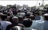 Iranians attending a funeral for a religious leader protest against the country's supreme leader Ayatollah Ali Khamenei, June 4, 2013. (screen capture: BBC News)