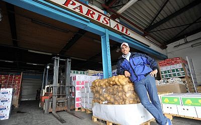 Marc Fichel at his stall at the Rungis wholesale market in Paris, May 29, 2013. (photo credit: Cnaan Liphshiz/JTA)