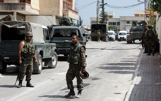 Lebanese Army soldiers during clashes that erupted between followers of a radical Sunni cleric Sheik Ahmad al-Assir and Shiite gunmen in Sidon, Lebanon, Monday, June 24 (AP Photo/Bilal Hussein) Lebanese Army soldiers during clashes that erupted between followers of a radical Sunni cleric Sheik Ahmad al-Assir and Shiite gunmen in Sidon, Lebanon, Monday, June 24 (AP Photo/Bilal Hussein)