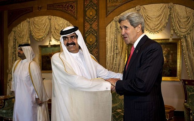 U.S. Secretary of State John Kerry, right, is greeted by Qatari Emir Hamad bin Khalifa Al Thani at Wajbah Palace in Doha, Qatar, on Sunday, June 23, 2013 (photo credit: AP/Jacquelyn Martin) U.S. Secretary of State John Kerry, right, is greeted by Qatari Emir Hamad bin Khalifa Al Thani at Wajbah Palace in Doha, Qatar, on Sunday, June 23, 2013 (photo credit: AP/Jacquelyn Martin)