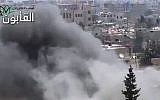 This image made from amateur video released by Ugarit News, which has been authenticated based on its contents and other AP reporting, shows smoke rises in Damascus, Syria, Friday, June 21, 2013. (Photo credit: AP/Ugarit News via AP video)