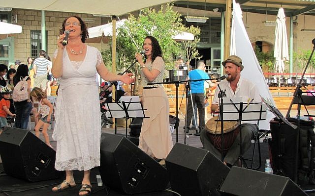 Rabbi Ruth Gan Kagan brings in Shabbat with her daughter and the Nava Tehila band (photo credit: Tal Chalutz)
