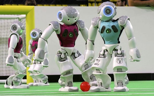Robots in the 'standard platform' division compete at the RoboCup championships in Eindhoven, Netherlands, on June 27, 2013. (photo credit: AP/Toby Sterling) Robots in the 'standard platform' division compete at the RoboCup championships in Eindhoven, Netherlands, on June 27, 2013. (photo credit: AP/Toby Sterling)