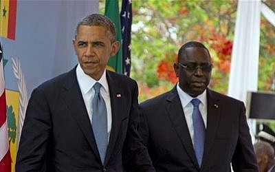 US President Barack Obama and Senegalese President Macky Sall leave after a news conference at the Presidential Palace in Dakar, Senegal Thursday, June 27, 2013 (photo credit: AP Photo/Evan Vucci)