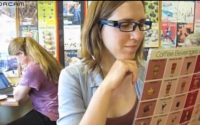 An OrCam device scans text and plays it back as speech for the visually impaired. (screen capture: Youtube/OrcamTechnologies)