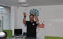 Kfir Damari of SpaceIL makes a point during his talk at the Jerusalem Startup Hub (Photo credit: Courtesy)