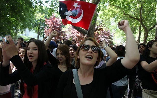 Turkish high school students protesting at Gezi park, Taksim square in Istanbul, Monday, June 3, 2013. (photo credit: Thanassis Stavrakis/AP). Turkish high school students protesting at Gezi park, Taksim square in Istanbul, Monday, June 3, 2013. (photo credit: Thanassis Stavrakis/AP).