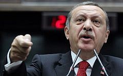 Turkey's Prime Minister Recep Tayyip Erdogan addresses lawmakers at the parliament in Ankara, Turkey, in June (photo credit: AP)