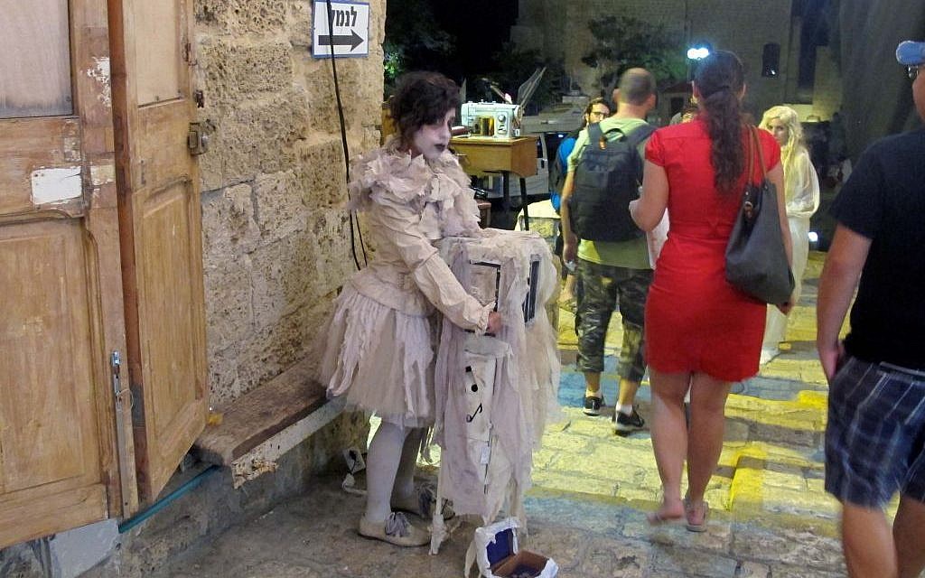 Local street performers flocked the alleyways of Jaffa for White Night (photo credit: Leeor Bronis/Times of Israel)