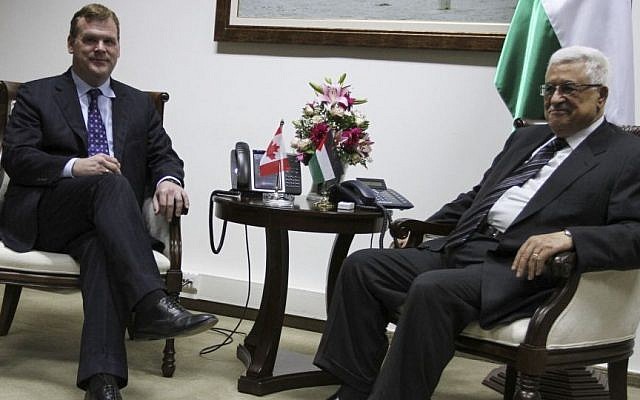 Palestinian Authority President Mahmoud Abbas, right, speaks with Canada's Foreign Minister John Baird during their meeting in the West Bank city of Ramallah, Monday, June 17, 2013. (Photo by Issam Rimawi/FLASH90)