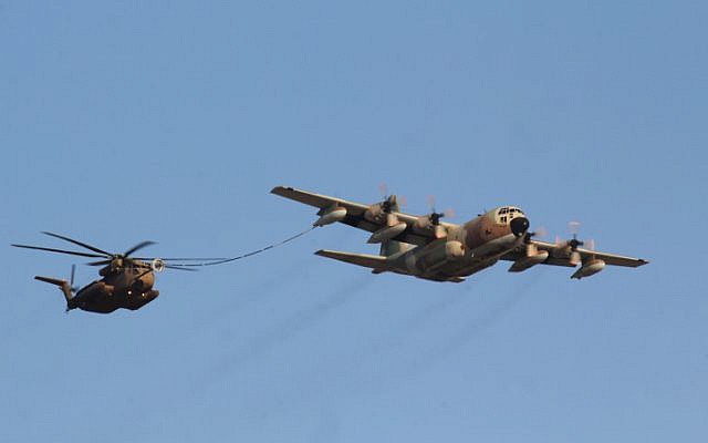 A demonstration of slow refueling during the IAF flight course 166 graduation ceremony in the Hatzerim Air Base in the Negev desert, southern Israel, on June 23, 2013 (photo credit: Ofer Zidon/Flash90)