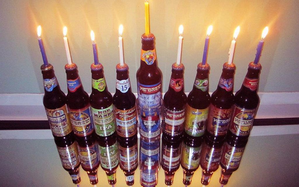 A menorah made of Shmaltz Brewing's He'Brew beer bottles. (photo credit: Shmaltz Brewing Facebook/JTA) A menorah made of Shmaltz Brewing's He'Brew beer bottles. (photo credit: Shmaltz Brewing Facebook/JTA)