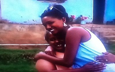 Yityish Titi Aynaw outside the home where she grew up in Ethiopia this week (photo credit: Channel 2 screenshot)