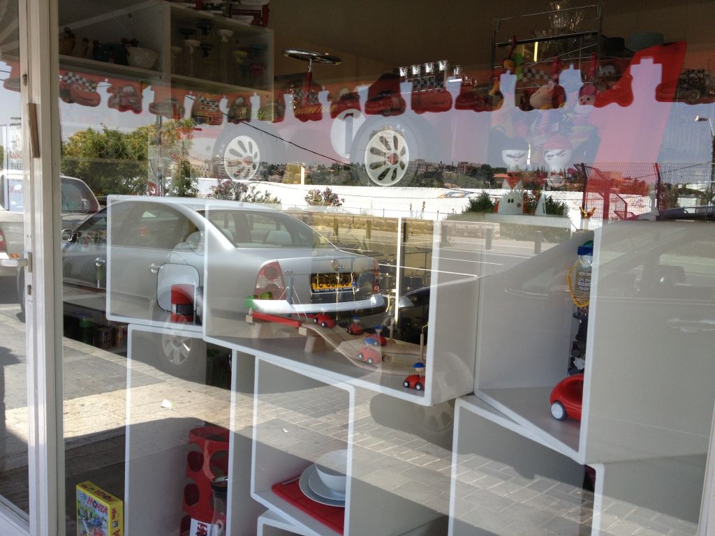 At 4U Gifts, owners Sarah Weinstein and Karen Etgar decided to turn the race into an opportunity, decorating their Hebron Road window in honor of the event (photo credit: Jessica Steinberg/Times of Israel)