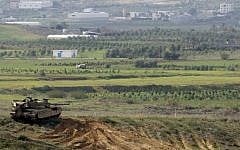 Illustrative. An Israeli tank overlooks the Gaza Strip. (Courtesy: Yad L'shiryon)