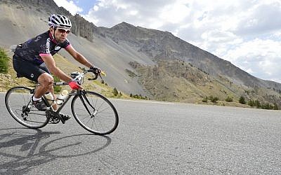 Guy Elyahou rides his bike (photo credit: courtesy)