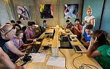 Web and tech pros work at the Do It Good Hackathon (Photo credit: Courtesy)