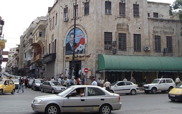 A street corner in the majority Alawite city of Latakia (photo credit: CC BY-Yazan Badran/Flickr) A street corner in the majority Alawite city of Latakia (photo credit: CC BY-Yazan Badran/Flickr)