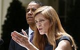President Barack Obama listens as Samantha Power speaks in the Rose Garden at the White House in Washington, Wednesday, June 5, 2013. (photo credit: AP/Charles Dharapak)