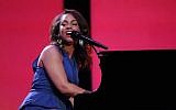Alicia Keys performing at a recent Walmart shareholders meeting. (photo credit: Courtesy Walmart)