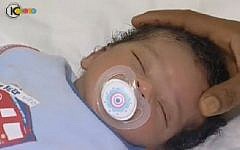 This baby was accidentally given to the wrong mother for nursing shortly after his birth (photo capture: Channel 10 news)
