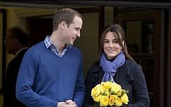 Prince William stands next to his wife, Kate, Duchess of Cambridge, on December 6, 2012. (photo credit: AP/Alastair Grant)
