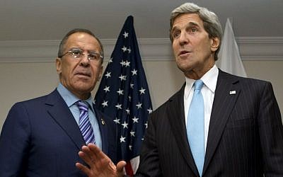 US Secretary of State John Kerry, right, takes questions from reporters with Russian Foreign Minister Sergey Lavrov in July 2013 (photo credit: AP/Jacquelyn Martin/File)
